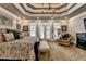 Comfortable and large main bedroom boasting natural light and stylish decor at 803 Amerden Ponds Ct, Johns Creek, GA 30097