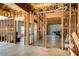 Unfinished basement providing ample space for customization and design at 263 Keller Dr, Mcdonough, GA 30252