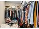 Walk-in closet with ample storage space for clothes, shoes and accessories at 263 Keller Dr, Mcdonough, GA 30252