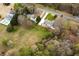 Aerial view showcases a home with a pool and expansive grassy yard at 4440 Cannon Rd, Loganville, GA 30052
