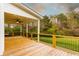 Back deck featuring wood decking and metal railings at 4440 Cannon Rd, Loganville, GA 30052