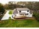 Aerial view showcases the back of the home with its lovely deck at 4440 Cannon Rd, Loganville, GA 30052