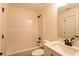 Bathroom featuring a shower-tub combo and granite vanity top at 4440 Cannon Rd, Loganville, GA 30052