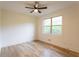 Bedroom with hardwood floors and natural light at 4440 Cannon Rd, Loganville, GA 30052