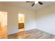 Bedroom with hardwood floors and adjacent bathroom at 4440 Cannon Rd, Loganville, GA 30052