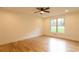 Spacious bedroom with natural light, wood floors and neutral colors creating a warm and inviting atmosphere at 4440 Cannon Rd, Loganville, GA 30052