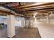 Clean crawl space featuring moisture barrier, two water heaters, and wrapped support pillars at 4440 Cannon Rd, Loganville, GA 30052