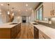 Gourmet kitchen featuring a large island, stainless appliances, and sleek countertops at 4440 Cannon Rd, Loganville, GA 30052