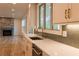 Modern kitchen boasts stainless steel appliances, quartz countertops, and ample cabinet space at 4440 Cannon Rd, Loganville, GA 30052