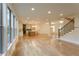 Open-concept living space with hardwood floors and natural light at 4440 Cannon Rd, Loganville, GA 30052