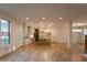 Open-concept living space featuring hardwood floors and natural light at 4440 Cannon Rd, Loganville, GA 30052