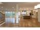 Bright living space features hardwood floors, large windows, and an open-concept kitchen with modern island at 4440 Cannon Rd, Loganville, GA 30052