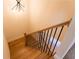 Staircase with wooden steps and metal railing at 4440 Cannon Rd, Loganville, GA 30052
