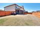 Expansive backyard featuring a wooden fence, providing privacy and ample space for outdoor activities at 910 Shannon Mist Dr, Loganville, GA 30052