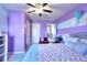 Well-decorated bedroom with pastel walls, comfortable furniture, and a ceiling fan for added comfort at 910 Shannon Mist Dr, Loganville, GA 30052
