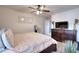 Bedroom with ceiling fan and television at 910 Shannon Mist Dr, Loganville, GA 30052
