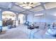 Spacious living room featuring archways into dining area and modern decor at 910 Shannon Mist Dr, Loganville, GA 30052