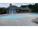 Community pool featuring a mushroom fountain in a shallow splash area at 910 Shannon Mist Dr, Loganville, GA 30052