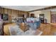 A living room features comfortable seating, wood floors, and unique design elements at 2735 Peachtree Walk, Duluth, GA 30096