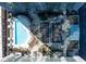 Aerial view showcasing the building's community pool, lush landscaping, and outdoor entertainment spaces at 923 Peachtree Ne St # 939, Atlanta, GA 30309