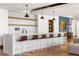 Modern bar featuring a sleek countertop, stylish seating, and contemporary lighting fixtures at 923 Peachtree Ne St # 939, Atlanta, GA 30309
