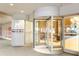 Modern building entrance with a revolving door and a sign that reads 'Metropolis' at 923 Peachtree Ne St # 939, Atlanta, GA 30309