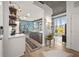 Open-concept kitchen with stainless steel appliances, white countertops, and large windows showcasing city views at 923 Peachtree Ne St # 939, Atlanta, GA 30309