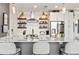 Contemporary kitchen with white cabinets, stainless steel appliances, and open shelving at 923 Peachtree Ne St # 939, Atlanta, GA 30309