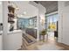 Modern kitchen with stainless steel appliances, island seating, and cityscape views from large windows at 923 Peachtree Ne St # 939, Atlanta, GA 30309