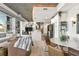 Open-concept kitchen and living room with modern furnishings, natural light, and contemporary design elements at 923 Peachtree Ne St # 939, Atlanta, GA 30309