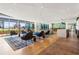Bright lounge area featuring modern seating, stylish decor, and expansive windows offering great views at 923 Peachtree Ne St # 939, Atlanta, GA 30309
