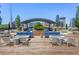 Inviting outdoor lounge with comfortable seating, fire pits, and stunning city views for relaxing and entertaining at 923 Peachtree Ne St # 939, Atlanta, GA 30309