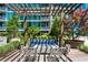 Cozy outdoor seating area features a built-in gas firepit and comfortable seating at 923 Peachtree Ne St # 939, Atlanta, GA 30309