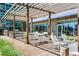 Inviting outdoor patio with a pergola, dining area, and a grilling station, perfect for entertaining at 923 Peachtree Ne St # 939, Atlanta, GA 30309