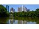 Scenic view of the city skyline reflected in the tranquil waters, showcasing the vibrant urban environment at 923 Peachtree Ne St # 939, Atlanta, GA 30309