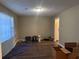 Living room with wood floors, neutral walls and natural light from a large window at 2943 E Howell Dr, Lawrenceville, GA 30044
