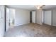 Neutral bedroom featuring carpeted floor, ceiling fan, and ensuite bathroom and walk in closet at 6225 Pebble Dr, Douglasville, GA 30135
