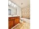 Standard bathroom featuring tile flooring, and a single sink vanity cabinet at 779 Harvest Brook Dr, Lawrenceville, GA 30043