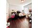 Bonus room featuring hardwood floors and a window allowing for lots of natural light at 779 Harvest Brook Dr, Lawrenceville, GA 30043