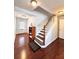 Inviting entry with a staircase, hardwood floors, and neutral wall paint at 779 Harvest Brook Dr, Lawrenceville, GA 30043