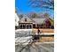 Charming home with brick and siding, a two-car garage, and manicured bushes at 779 Harvest Brook Dr, Lawrenceville, GA 30043