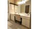 Spacious bathroom with a dual vanity, ample counter space, and storage cabinets at , Stone Mountain, GA 30087