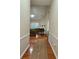 Sun-drenched living room showcases beautiful hardwood floors and high vaulted ceilings at , Stone Mountain, GA 30087