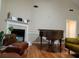Cozy living room featuring a fireplace, piano, and hardwood floors at , Stone Mountain, GA 30087