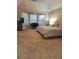 Spacious main bedroom with a vaulted ceiling, neutral carpet, sitting area and large windows at , Stone Mountain, GA 30087