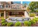 Multi-tiered backyard deck and patio offers outdoor space for entertainment and relaxation at 1100 Muirfield Ct, Alpharetta, GA 30005