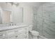 Modern bathroom with marble countertop, sleek fixtures, and luxurious glass walk-in shower at 1100 Muirfield Ct, Alpharetta, GA 30005