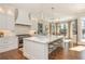Bright, updated kitchen with stainless steel appliances, a large island, and lots of seating at 1100 Muirfield Ct, Alpharetta, GA 30005