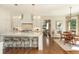 Spacious kitchen with stainless steel appliances, large island, and adjacent dining area at 1100 Muirfield Ct, Alpharetta, GA 30005