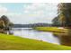 Picturesque water view of the lake and golf course providing a tranquil setting at 1100 Muirfield Ct, Alpharetta, GA 30005
